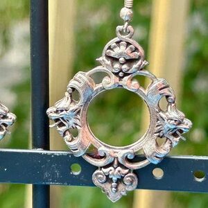 Earrings, large silver baroque design.